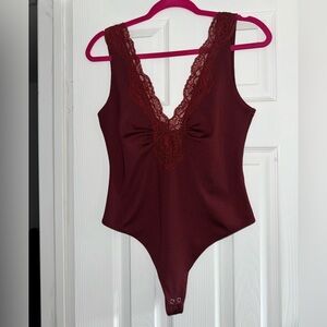 Burgundy Free People Lace Bodysuit size medium NWOT perfect! 😍